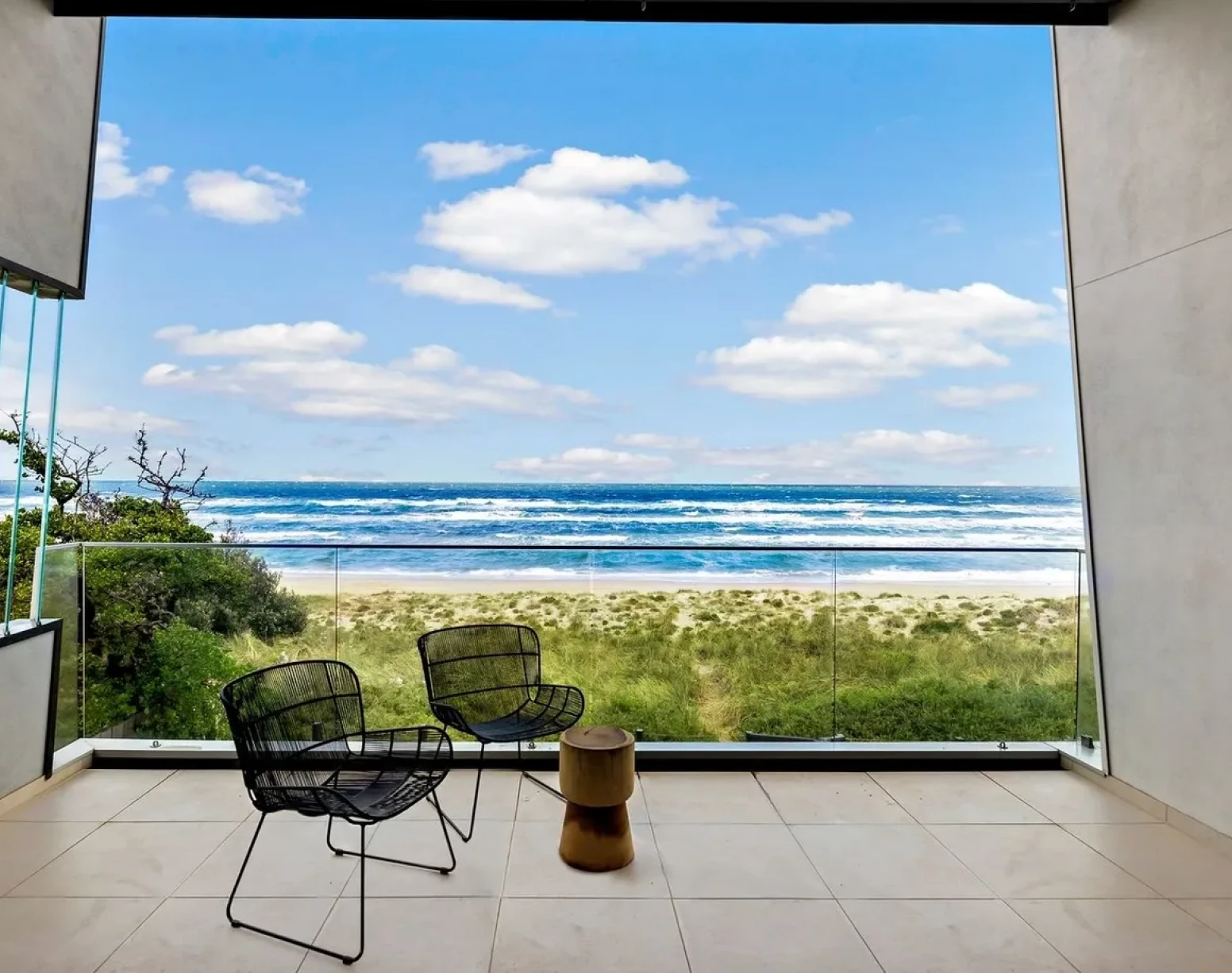 Scenic beachfront balcony with sea view.